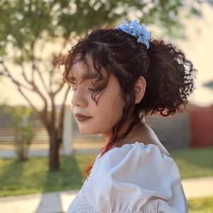 Light blue and white flower with pearl hair clip